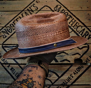 The Stroke of Blue's hatband